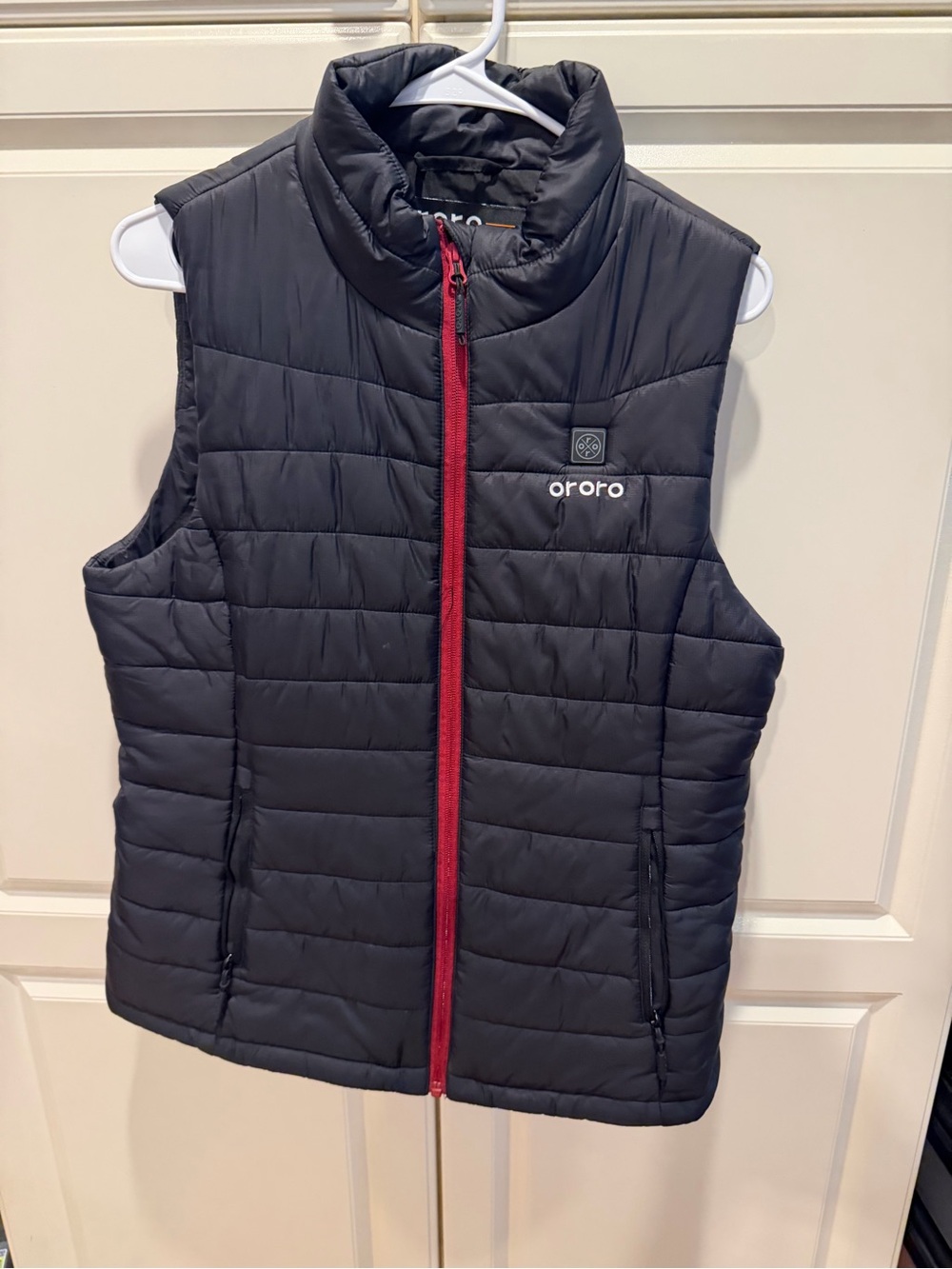 Ororo Women’s Black Quilted Puffer Vest with Red Zip- no battery but does work.